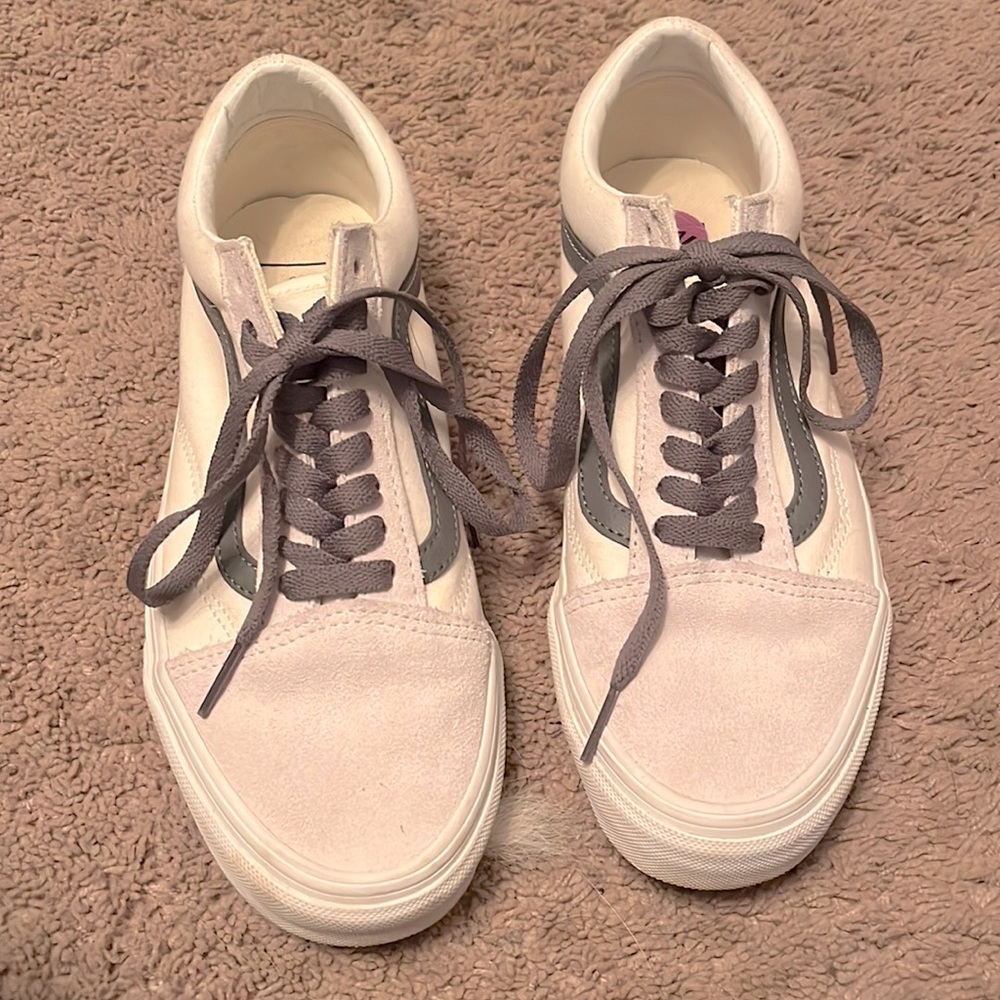 Grey and white low top vans